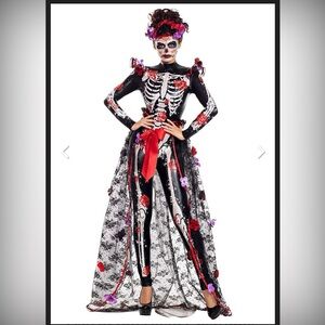 Colorful day of the dead costume .